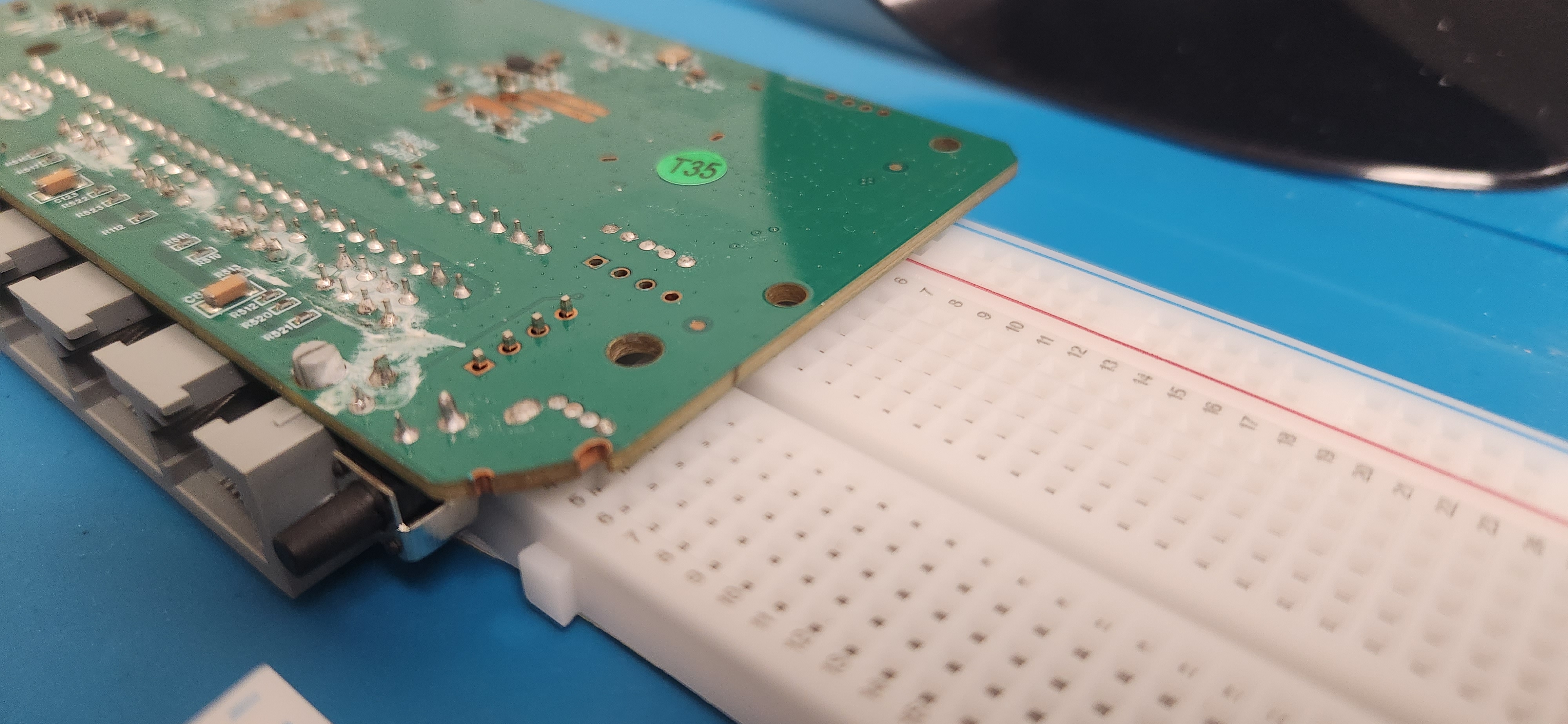 Breadboard acting as a jig for the PCB I&rsquo;m soldering the pin headers onto